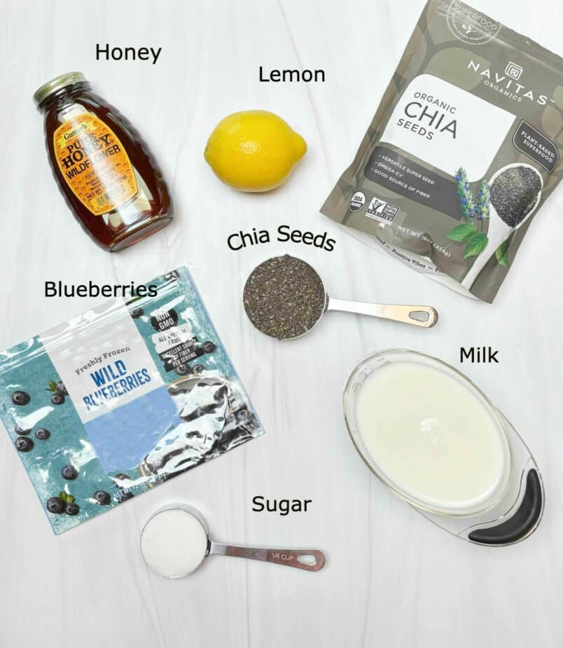 Ingredients used to make Lemon Chia Pudding on a marble counter