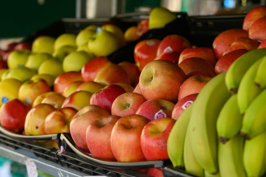 Red and Green apples on display in a market